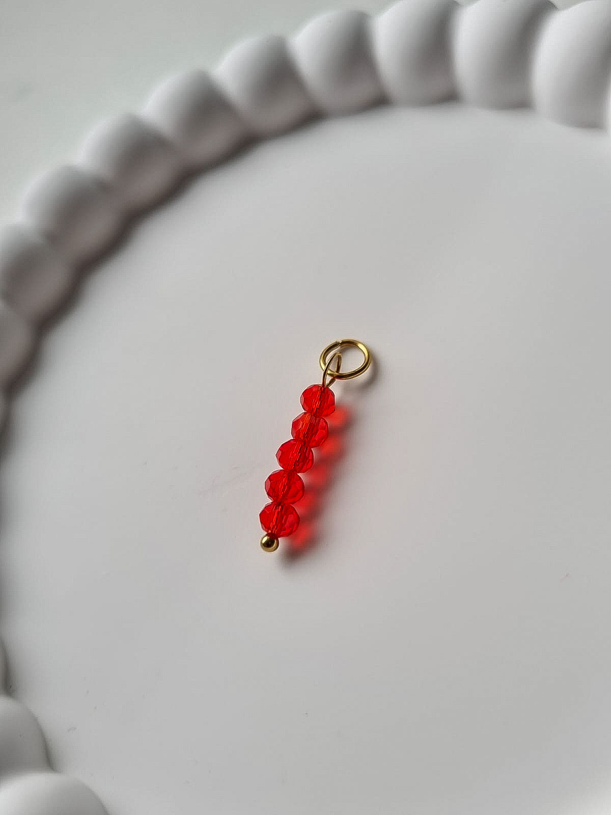 RED FOUR BEADS CHARM