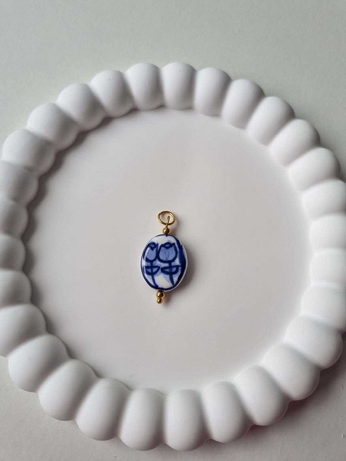 PORCELAIN CHARM